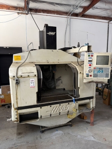 1992 HAAS VF-0 CNC VERTICAL MACHINING CENTER, TABLE: 26" X 14", XYZ TRAVELS: 20" X 16" X 20", CAT 40 TAPER, 7,500 RPM SPINDLE, 20 ATC, 7.5 HP, S/N 1870-34A