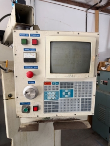 1992 HAAS VF-0 CNC VERTICAL MACHINING CENTER, TABLE: 26" X 14", XYZ TRAVELS: 20" X 16" X 20", CAT 40 TAPER, 7,500 RPM SPINDLE, 20 ATC, 7.5 HP, S/N 1870-34A