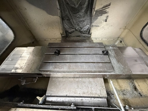 1992 HAAS VF-0 CNC VERTICAL MACHINING CENTER, TABLE: 26" X 14", XYZ TRAVELS: 20" X 16" X 20", CAT 40 TAPER, 7,500 RPM SPINDLE, 20 ATC, 7.5 HP, S/N 1870-34A