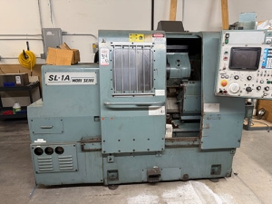 Mori Seiki-MORI SEIKI SL-1A CNC TURNING CENTER, YASNAC CNC CONTROL, 12-STATION TURRET, 6,000 RPM, MAX TURNING DIAMETER: 5.91", MAX TURNING LENGTH: 10.83", SWING OVER BED: 16.5", CHIP CONVEYOR, S/N 247-34B
