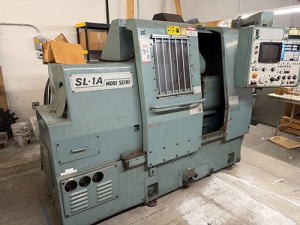 Mori Seiki-MORI SEIKI SL-1A CNC TURNING CENTER, YASNAC CNC CONTROL, 12-STATION TURRET, 6,000 RPM, MAX TURNING DIAMETER: 5.91", MAX TURNING LENGTH: 10.83", SWING OVER BED: 16.5", CHIP CONVEYOR, S/N 247-34B
