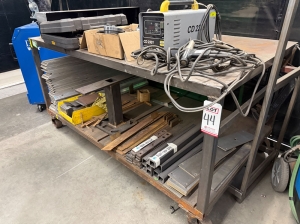 WELDING TABLE W/ 4' X 6-1/2' STEEL TOP, 39-1/2" TOP HT, STEEL CASTERS, CONTENTS NOT INCLUDED-44