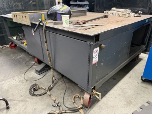 WELDING TABLE W/ 6-1/2' X 10' X 1/2" THICK TOP, 36" TOP HT, STEEL CASTERS, CONTENTS NOT INCLUDED-45