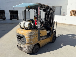 2004 CATERPILLAR LPG FORKLIFT, MODEL GC30K, 6,000 LB CAPACITY, 4-STAGE MAST, SIDE SHIFT, 5' FORKS, SOLID CUSHION TIRES, LOAD LIGHTS, REARVIEW MIRRORS, REAR SAFETY BEACON, CLEARCAP RAINCAP, APPROX. 8,077 HOURS, S/N AT83E00502, (DELAYED PICKUP UNTIL TUESDAY, AUGUST 18)-64