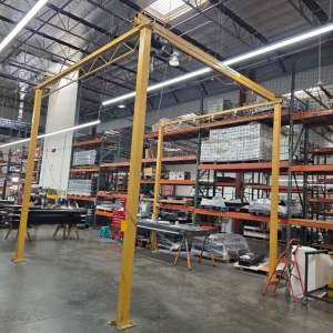 SHOP CRANE 2,000 LB CAPACITY FREESTANDING BRIDGE CRANE W/ ELECTRIC CABLE HOIST, PENDANT CONTROL, 14-1/2' BRIDGE LENGTH, 14-1/2' RUNWAY LENGTH, 12-1/2' HIGHEST HOOK HT, APPROX. 15' OVERALL HT-65
