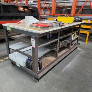 STEEL TABLE ON CASTERS W/ 8'-4" X 3' WOOD TOP, 43" TOP HT, CONTENTS NOT INCLUDED-162