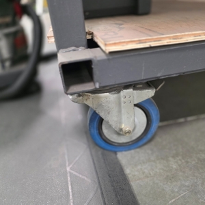 STEEL TABLE ON CASTERS W/ 12' X 4' WOOD TOP, 37" TOP HT, CONTENTS NOT INCLUDED-170