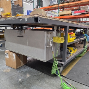 STEEL TABLE ON CASTERS W/ 14' X 4' PLYWOOD TOP, 37" TOP HT, CONTENTS NOT INCLUDED-173