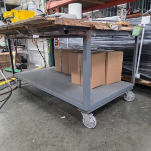 STEEL TABLE W/ 62" X 4" WOOD TOP, 32" TOP HT, CONTENTS NOT INCLUDED-204