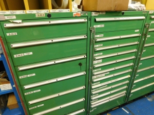 DOUBLE-SIDED ISLAND AREA: 5'X16'X8'! HIGHLIGHTS: GREEN OKUMA PARTS CABINET ENDCAP! (2) 7'X2'X8' SHELF UNITS FULL OF ASSORTED PARTS & PIECES: VARIOUS DIAMETERS OF SOFT COPPER PIPE ROLLS, BIG MACHINE DRIVE SCREWS, WELDING REGULATORS, 6 LISTA CABINETS, 28"X28"X60" & 2 STANLEY VIDMAR 30"X28"X66"CABINETS FULL OF ALL TYPES/SIZES OF BEARINGS, BAND HEATERS, VARIOUS SIZES OF LINK BELT CHAIN LENGTHS, SCHRADER BELLOWS PARTS, ELECTRONIC PARTS, CIRCUIT BOARDS, SELF FEED PARTS/TOOLS, RUBBER DRIVE BELTS, HOLE SAVERS,MOKON PARTS, SANDBLAST PARTS, LATHE PARTS, AIR LINE REGULATORS/LUBRICATORS, LIGHT BULBS, WELDING ACCESSORIES, ETC. - TOO MUCH TO LIST - COME SEE IT ALL, OR VIEW PHOTOS!-351