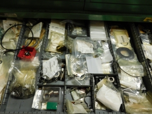 DOUBLE-SIDED ISLAND AREA: 5'X16'X8'! HIGHLIGHTS: GREEN OKUMA PARTS CABINET ENDCAP! (2) 7'X2'X8' SHELF UNITS FULL OF ASSORTED PARTS & PIECES: VARIOUS DIAMETERS OF SOFT COPPER PIPE ROLLS, BIG MACHINE DRIVE SCREWS, WELDING REGULATORS, 6 LISTA CABINETS, 28"X28"X60" & 2 STANLEY VIDMAR 30"X28"X66"CABINETS FULL OF ALL TYPES/SIZES OF BEARINGS, BAND HEATERS, VARIOUS SIZES OF LINK BELT CHAIN LENGTHS, SCHRADER BELLOWS PARTS, ELECTRONIC PARTS, CIRCUIT BOARDS, SELF FEED PARTS/TOOLS, RUBBER DRIVE BELTS, HOLE SAVERS,MOKON PARTS, SANDBLAST PARTS, LATHE PARTS, AIR LINE REGULATORS/LUBRICATORS, LIGHT BULBS, WELDING ACCESSORIES, ETC. - TOO MUCH TO LIST - COME SEE IT ALL, OR VIEW PHOTOS!-351