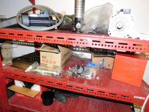 LOT OF (2) SECTIONS OF RED SHELVING W/CONTENTS (SEE PHOTOS)-352