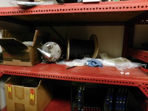 LOT OF (2) SECTIONS OF RED SHELVING W/CONTENTS (SEE PHOTOS)-352