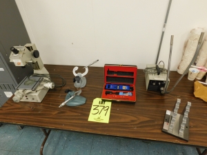 LOT OF TABLETOP ITEMS TO INCLUDE: MITUTOYO TOOLMAKERS MICROSCOPE, AMETEK ACCUFORCE CADET FORCE GAGE, DOLAN-JENNER FIBER-LITE HIGH INTENSITY ILLUMINATOR, SIZE CONTROL MIKEMASTER MS-81-D1 FOR MICROMETER CALLIBRATION:6"(0.500"-5.500"), MITUTOYO 114-202 V-ANVIL MICROMETER W/STAND, STARRETT 483 V-ANVIL MICROMETER W/STAND-379
