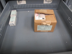STANLEY VIDMAR CABINET, 5 DRAWER, TO INCLUDE: HYDRAULIC ADJUSTERS, PROBES, PRINTED CIRCUIT BOARDS, HEX NUTS. LOCATED AT W-44. LOADING AND HANDLING FEE $25-354