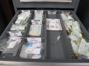 STANLEY VIDMAR CABINET, 5 DRAWER, TO INCLUDE: PIPE NIPPLES, CONNECTORS, SOLENOID VALVES, PRINTED CIRCUIT BOARDS. LOCATED AT W-44. LOADING AND HANDLING FEE $25-359