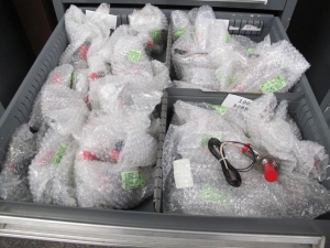 STANLEY VIDMAR CABINET, 5 DRAWER, TO INCLUDE: PIPE NIPPLES, CONNECTORS, SOLENOID VALVES, PRINTED CIRCUIT BOARDS. LOCATED AT W-44. LOADING AND HANDLING FEE $25-359