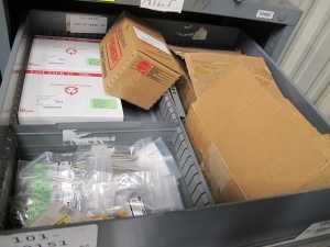 STANLEY VIDMAR CABINET, 5 DRAWER, TO INCLUDE: BATTERIES, PRESSURE REGULATORS, FUSES, GLAND VALVES, CONNECTORS, COMPRESSOR VALVES, . LOCATED AT W-44. LOADING AND HANDLING FEE $25-364