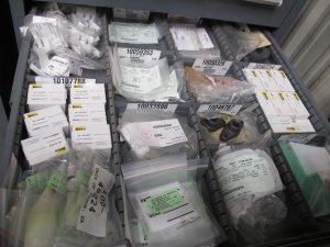 STANLEY VIDMAR CABINET, 5 DRAWER, TO INCLUDE: BATTERIES, PRESSURE REGULATORS, FUSES, GLAND VALVES, CONNECTORS, COMPRESSOR VALVES, . LOCATED AT W-44. LOADING AND HANDLING FEE $25-364