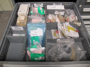 STANLEY VIDMAR CABINET, 5 DRAWER, TO INCLUDE: CAPACITORS, DETECTORS, CONTROL VALVES, TUBE CONNECTORS, COMPRESSOR VALVES, SEAT VALVES, RECTIFIERS, CONNECTOR, MOTOR CHART DRIVES. . LOCATED AT W-44. LOADING AND HANDLING FEE $25-368