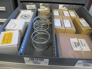 STANLEY VIDMAR CABINET, 11 DRAWER, TO INCLUDE: TUBE PLUGS, VALVES, SPRINGS, PINS, CIRCUIT BREAKERS, CAPACITORS. LOCATED AT W-44. LOADING AND HANDLING FEE $25-370