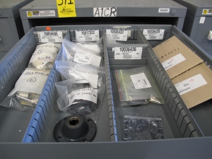 STANLEY VIDMAR CABINET, 11 DRAWER, TO INCLUDE: GASKETS, PRESSURE REGULATORS, INCANDESCENT LIGHTS, COUPLING SLEEVES, PRINTEDC CIRCUIT BOARDS, AIR FILTERS, BUSHINGS. LOCATED AT W-44. LOADING AND HANDLING FEE $25-371