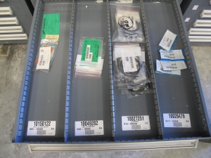STANLEY VIDMAR CABINET, 11 DRAWER, TO INCLUDE: GASKETS, PRESSURE REGULATORS, INCANDESCENT LIGHTS, COUPLING SLEEVES, PRINTEDC CIRCUIT BOARDS, AIR FILTERS, BUSHINGS. LOCATED AT W-44. LOADING AND HANDLING FEE $25-371