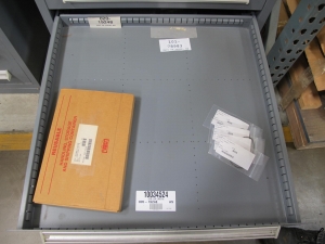 STANLEY VIDMAR CABINET, 11 DRAWER, TO INCLUDE: LIGHT BULBS, CHECK VALVES, PNUEMATIC TIME DELAY ATTACHMENTS, DEFLECTORS, CAMERA LENS, RECTIFIER, MISC MODULES, PRESSURE GAUGE, COMPRESSOR PISTONS. LOCATED AT W-50 . LOADING AND HANDLING FEE $25-372