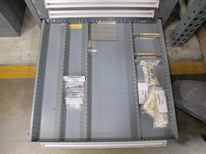STANLEY VIDMAR CABINET, 11 DRAWER, TO INCLUDE: LIGHT BULBS, CHECK VALVES, PNUEMATIC TIME DELAY ATTACHMENTS, DEFLECTORS, CAMERA LENS, RECTIFIER, MISC MODULES, PRESSURE GAUGE, COMPRESSOR PISTONS. LOCATED AT W-50 . LOADING AND HANDLING FEE $25-372