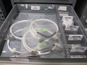 STANLEY VIDMAR CABINET, 11 DRAWER, TO INCLUDE: BIFURCATED CONTACTS, HINGES, BRACKETS, CORDS, MISC MODULES, THERMOWELLS, ELECTRICAL CONNECTORS, PROTECTORS, ELECTRIC VOLT METERS, PROBES. LOCATED AT W-50 . LOADING AND HANDLING FEE $25-373