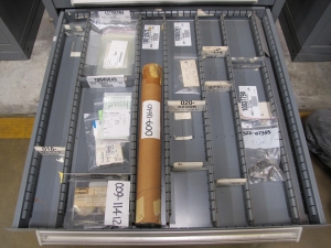 STANLEY VIDMAR CABINET, 11 DRAWER, TO INCLUDE: AMP METER, THERMOSTAT, TRANSMITTER ASSEMBLY, CONNECTOR SLEEVES, SPECTROME AMPLIFIER, PILOT RELAY, FUSES, FLOAT MONELS, CORDS. LOCATED AT W-50 . LOADING AND HANDLING FEE $25-374