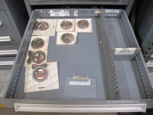 STANLEY VIDMAR CABINET, 11 DRAWER, TO INCLUDE: TERMINAL BLOCKS, PILOT LIGHTS, BELLOWS, SHAFTS, CAPS, PLUG VALVES, CIRCUITS . LOCATED AT W-50 . LOADING AND HANDLING FEE $25-375