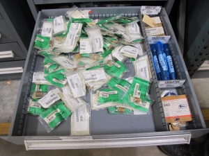 STANLEY VIDMAR CABINET, 11 DRAWER, TO INCLUDE: TERMINAL BLOCKS, PILOT LIGHTS, BELLOWS, SHAFTS, CAPS, PLUG VALVES, CIRCUITS . LOCATED AT W-50 . LOADING AND HANDLING FEE $25-375