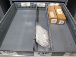 STANLEY VIDMAR CABINET, 11 DRAWER, TO INCLUDE: VOLT METERS, THERMOCOUPLE WIRE, BALLASTS, GROMMETS, ROLLERS, BLANK METERS, SUPPRESSORS. LOCATED AT W-50 . LOADING AND HANDLING FEE $25-377