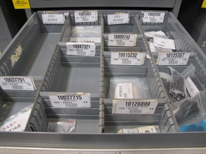 STANLEY VIDMAR CABINET, 8 DRAWER, TO INCLUDE: LIGHT BULBS, SWITCHES, PLUGS, RADIO ANTENNAS, CONTACT BLOCKS, CIRCUITS, SURGE PROTECTORS, SOCKETS, CORDS. LOCATED AT W-50 . LOADING AND HANDLING FEE $25-380