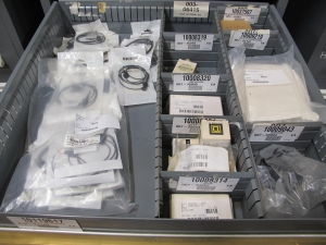 STANLEY VIDMAR CABINET, 8 DRAWER, TO INCLUDE: LIGHT BULBS, SWITCHES, PLUGS, RADIO ANTENNAS, CONTACT BLOCKS, CIRCUITS, SURGE PROTECTORS, SOCKETS, CORDS. LOCATED AT W-50 . LOADING AND HANDLING FEE $25-380