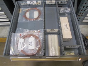 STANLEY VIDMAR CABINET, 8 DRAWER, TO INCLUDE: FLOW DETECTORS, TERMINAL BLOCKS, CAPACITORS, LUBRICATORS, CIRCUIT BREAKERS, VALVE MANIFOLDS, KEYBOARD DISPLAYS, PRESSURE REGULATOR. LOCATED AT W-50 . LOADING AND HANDLING FEE $25-381