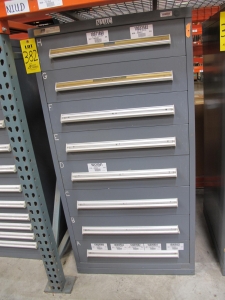 STANLEY VIDMAR CABINET, 8 DRAWER, TO INCLUDE: RIVETS, ELECTRICAL SOCKETS, CAPS, PHOTOELECTRIC CELLS, CAPACITORS, WORM AND SPUR GEARS, POWER SUPPLY, OILERS. LOCATED AT W-50 . LOADING AND HANDLING FEE $25-382