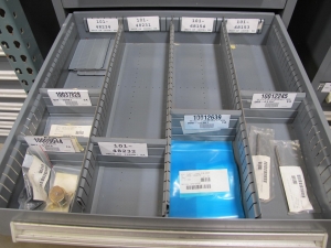 STANLEY VIDMAR CABINET, 8 DRAWER, TO INCLUDE: RIVETS, ELECTRICAL SOCKETS, CAPS, PHOTOELECTRIC CELLS, CAPACITORS, WORM AND SPUR GEARS, POWER SUPPLY, OILERS. LOCATED AT W-50 . LOADING AND HANDLING FEE $25-382