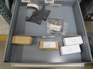 STANLEY VIDMAR CABINET, 8 DRAWER, TO INCLUDE: RIVETS, ELECTRICAL SOCKETS, CAPS, PHOTOELECTRIC CELLS, CAPACITORS, WORM AND SPUR GEARS, POWER SUPPLY, OILERS. LOCATED AT W-50 . LOADING AND HANDLING FEE $25-382