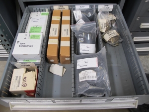 STANLEY VIDMAR CABINET, 8 DRAWER, TO INCLUDE: THERMOMETER, PHONE CORDS, RELAYS, HYGROMETERS, TERMINAL WIRES, FILTERS, MISC BRASS PARTS, SCREW KIT FOR ROSEMOUNT TRANSMITTERS. LOCATED AT W-50 . LOADING AND HANDLING FEE $25-384