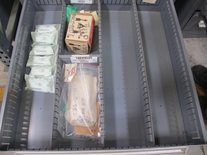 STANLEY VIDMAR CABINET, 8 DRAWER, TO INCLUDE: THERMOMETER, PHONE CORDS, RELAYS, HYGROMETERS, TERMINAL WIRES, FILTERS, MISC BRASS PARTS, SCREW KIT FOR ROSEMOUNT TRANSMITTERS. LOCATED AT W-50 . LOADING AND HANDLING FEE $25-384