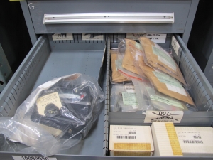 STANLEY VIDMAR CABINET, 8 DRAWER, TO INCLUDE: TERMINAL BLOCK/OUTLETS, BRAKE LINING, MOTOR REPAIR KITS, TEMPERATURE METERS, CONTROLLERS, HEADSETS, MANOMETER SLIDES. LOCATED AT W-50 . LOADING AND HANDLING FEE $25-385
