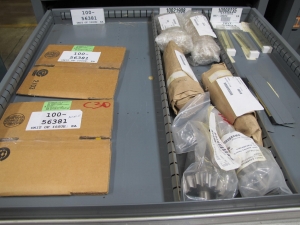 STANLEY VIDMAR CABINET, 5 DRAWER, TO INCLUDE: ELBOWS, ANCHORS, PINION GEARS, ARC CHUTES, ELECTRONIC BALANCES, STRAINERS. LOCATED AT W-50 . LOADING AND HANDLING FEE $25-386