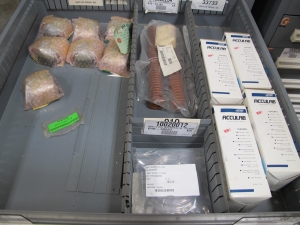 STANLEY VIDMAR CABINET, 5 DRAWER, TO INCLUDE: ELBOWS, ANCHORS, PINION GEARS, ARC CHUTES, ELECTRONIC BALANCES, STRAINERS. LOCATED AT W-50 . LOADING AND HANDLING FEE $25-386