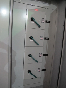 INDUSTRIAL ELECTRIC MANUFACTURING, MOTOR CONTROL CENTER, VOLTS 480, 60 HZ, THREE PHASE, SECTION AMPS 2000, SUPPLY AMPS 4000, R.M.S SYMMETRICAL AMPS 65000, 3 COLUMN WITH (8) SIEMENS VACU-BRAKE SWITCH BREAKERS. 600 AMP, 600 VOLT MAX, THREE POLE, THREE PHASE, (1) SIEMENS VACU-BRAKE SWITCH BREAKER, 400 AMP, 400 MAX VOLTS, THREE POLE, THREE PHASE. LOCATED AT W-50 . LOADING AND HANDLING FEE $200-387