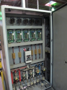 1999 CLIFFORD AUTOMATIC CNC MESH WELDING LINE, MODEL CLW12, 8MM-3MM LINE WIRE DIAMETER, 20 WIRE LINES, CROSSWIRE DIAMETER: 6MM, CROSSWIRE LENGTH: 1300 MM, LINEWIRE PITCH: INFINITELY VARIABLE FROM 10MM, CROSSWIRE FEED: SINGLE GAP TYPE MAGAZINE TOOLED FOR PRODUCING 2 MATS, SIDE BY SIDE, (10) WELDPRESSES, (20) BOTTOM ELECTRODES, (4) 125 KVA WELDING TRANSFORMERS, 120 CROSSWIRES MAX. SPEED, LINEAR MODEL QM12/25 PAILOUT, AUTOMATIC SHEET STACKER, WATER COOLING SYSTEM, MITSUISHI A1 CNC CONTROL, S/N 8874, SHEET STACKER, S/N 8979, (2) ENCLOSED CARTS FULL OF WELDING TIPS AND REALTED TOOLING INCLUDED WITH MACHINE-2