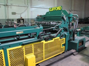 1999 CLIFFORD AUTOMATIC CNC MESH WELDING LINE, MODEL CLW12, 8MM-3MM LINE WIRE DIAMETER, 20 WIRE LINES, CROSSWIRE DIAMETER: 6MM, CROSSWIRE LENGTH: 1300 MM, LINEWIRE PITCH: INFINITELY VARIABLE FROM 10MM, CROSSWIRE FEED: SINGLE GAP TYPE MAGAZINE TOOLED FOR PRODUCING 2 MATS, SIDE BY SIDE, (10) WELDPRESSES, (20) BOTTOM ELECTRODES, (4) 125 KVA WELDING TRANSFORMERS, 120 CROSSWIRES MAX. SPEED, LINEAR MODEL QM12/25 PAILOUT, AUTOMATIC SHEET STACKER, WATER COOLING SYSTEM, MITSUISHI A1 CNC CONTROL, S/N 8874, SHEET STACKER, S/N 8979, (2) ENCLOSED CARTS FULL OF WELDING TIPS AND REALTED TOOLING INCLUDED WITH MACHINE-2