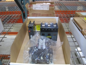 MISC. SQUARE-D AND CUTLER HAMMER MOTOR CIRCUIT PROTECTORS WITH ROLLS OF REFLECTIVE TARP. LOADING & HANDLING $5-1471