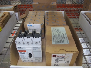 MISC. SQUARE-D AND CUTLER HAMMER MOTOR CIRCUIT PROTECTORS WITH ROLLS OF REFLECTIVE TARP. LOADING & HANDLING $5-1471